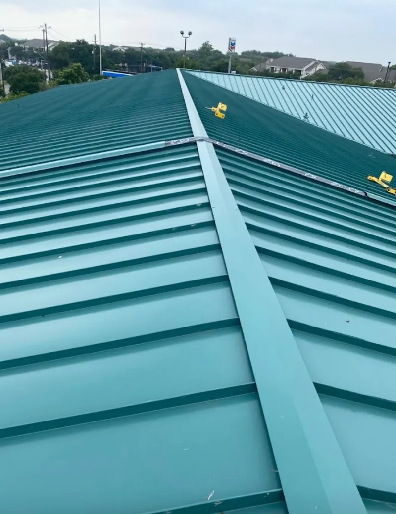 Green commercial metal roof ridge and valley for Metal Roof Repair in Everett