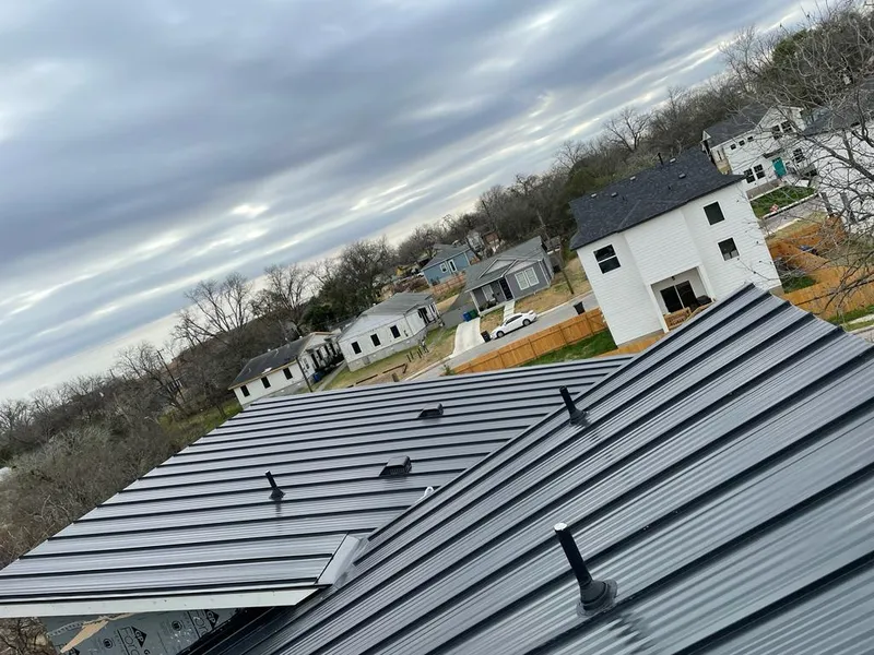 Standing seam metal roof panels with vents for Skylight Repair in Everett
